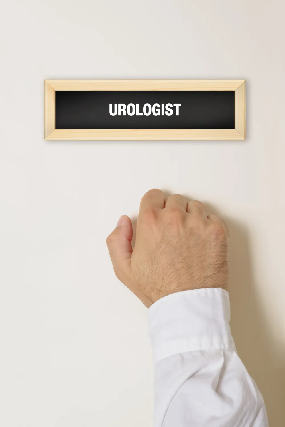 Foto puerta con cartel de Urólogo